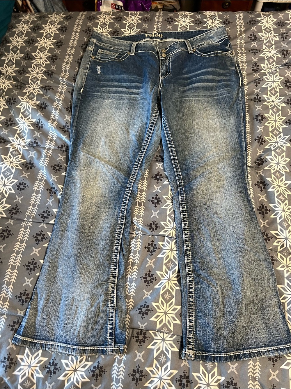 Reign Women's Bootcut Jeans in Faded Blue Wash